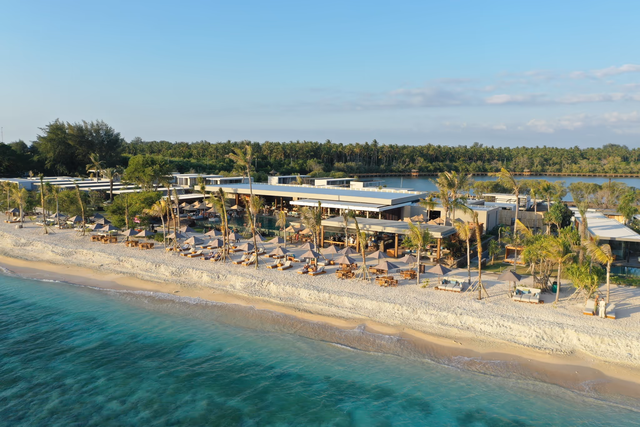 BASK Beach Club pool and daybeds with sea view